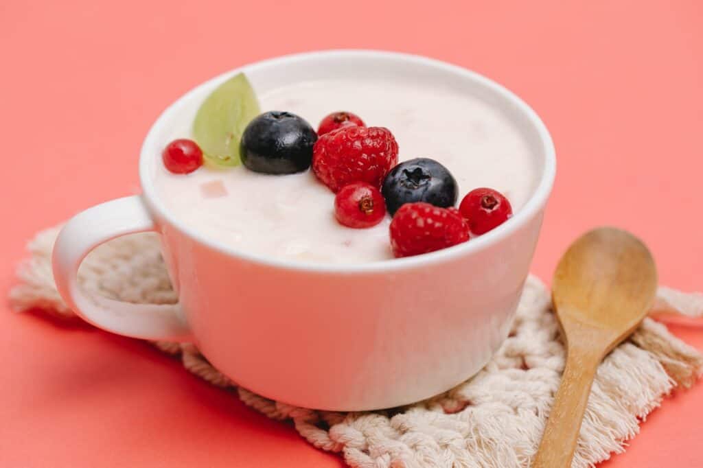yoghurt and berries in a cup